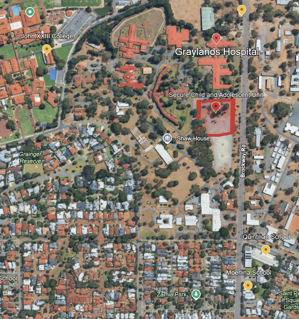 Satellite map showing Graylands Hospital, the Secure Child and Adolescent Unit marked with its own fenced red perimeter, Shaw House, and the short distance along Brockway Road to Quintilian School and Moerlina School.
